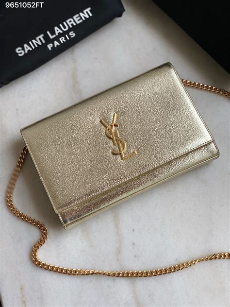 ysl gold logo bag|ysl bag gold hardware.